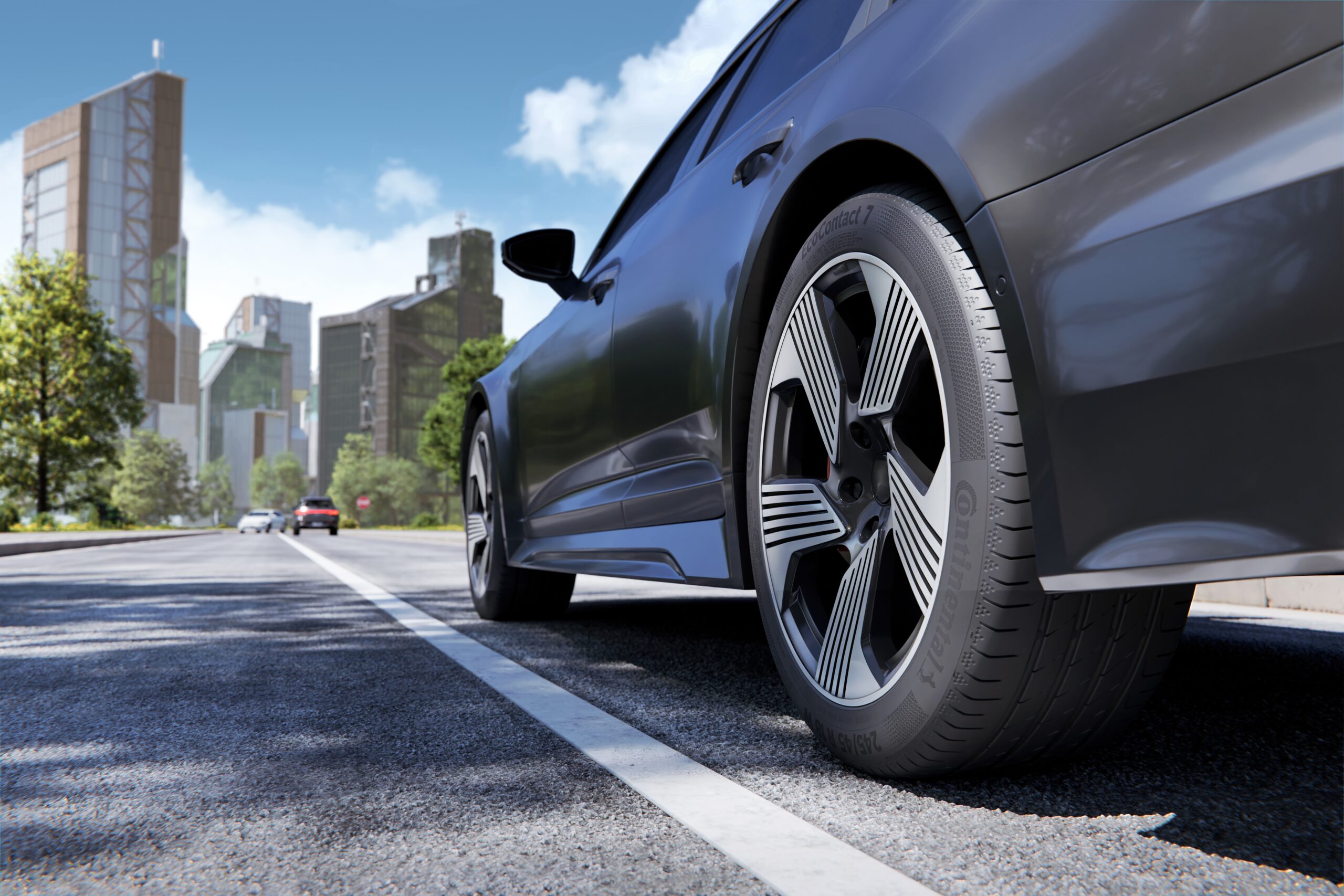 Continental EcoContact 7 fitted to an electric vehicle in an urban setting, illustrating the tyre approved for the Škoda Elroq